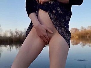 Shy Redhead Undresses Outdoors First Time