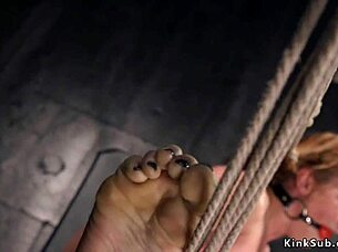 Tied up brunette toyed in dungeon, rough and bizarre