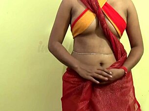 A woman wears a retro saree for a fashion show.