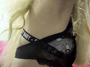 Want to see a transvestite trying out sex toys?