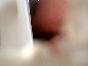 spying on someone using the bathroom toilet