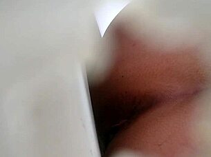 spying on someone using the bathroom toilet