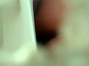 spying on someone using the bathroom toilet