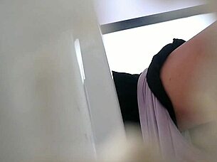 spying on someone using the bathroom toilet