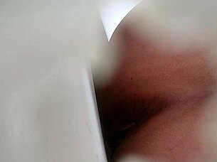 spying on someone using the bathroom toilet