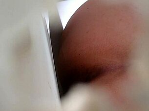 spying on someone using the bathroom toilet